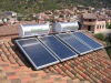 Compact pressurized flat panel solar water heater